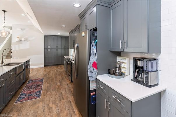 Interior, Kitchen, Pendant Lights, Recessed Lighting, Stainless Steel Appliances, Wood Texture Flooring
