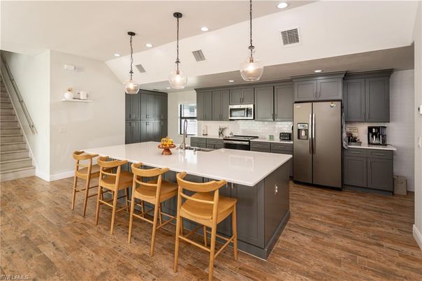 Interior, Kitchen, Pendant Lights, Recessed Lighting, Stainless Steel Appliances, Wood Texture Flooring