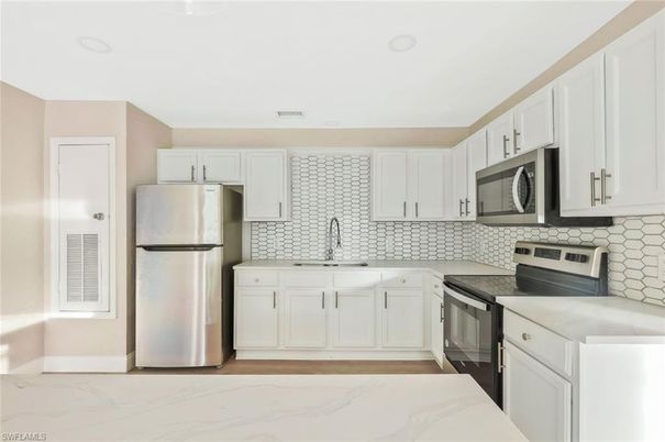 Interior, Kitchen, Marble, Recessed Lighting, Stainless Steel Appliances