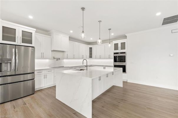 Interior, Kitchen, Pendant Lights, Recessed Lighting, Stainless Steel Appliances, Wood Texture Flooring