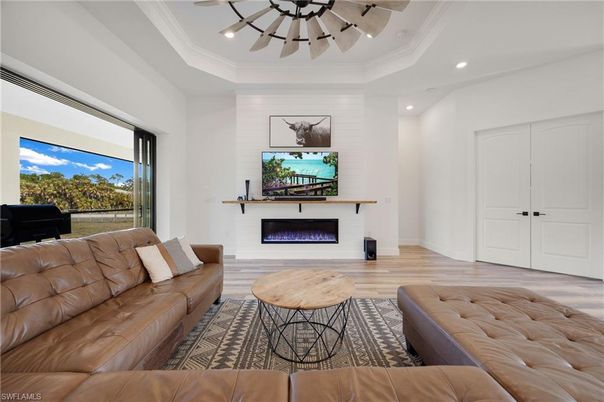 Fireplace, Interior, Living room, Pendant Lights, Recessed Lighting, Wood Texture Flooring