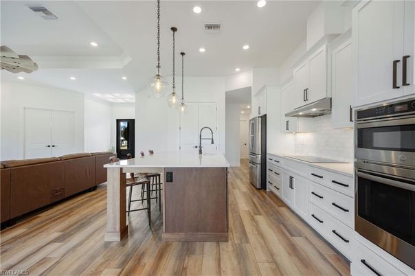 Interior, Kitchen, Living room, Pendant Lights, Recessed Lighting, Stainless Steel Appliances, Wood Texture Flooring