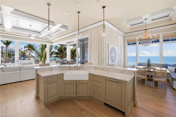 Chandelier, Dining room, Interior, Kitchen, Living room, Pendant Lights, Recessed Lighting, Water, Wood Texture Flooring