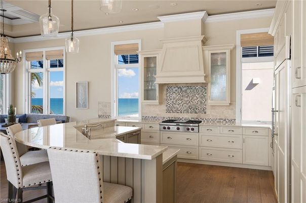 Dining room, Interior, Kitchen, Pendant Lights, Recessed Lighting, Stainless Steel Appliances, Water, Wood Texture Flooring