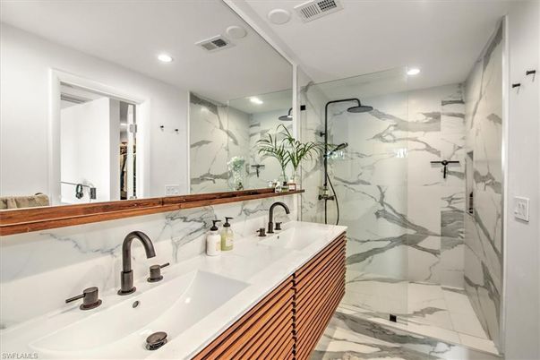 Bathroom, Dual Sink Vanities, Glass Shower, Interior, Marble, Marble Walls, Recessed Lighting