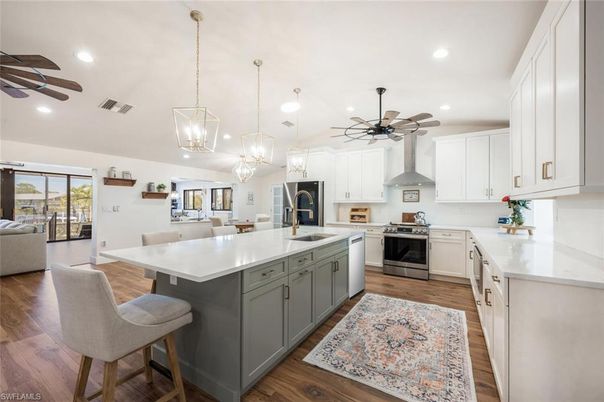 Dining room, Interior, Kitchen, Pendant Lights, Recessed Lighting, Stainless Steel Appliances, Wood Texture Flooring