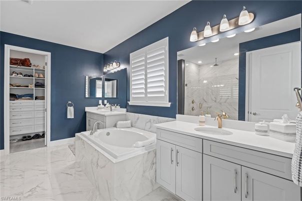 Bathroom, Dual Sink Vanities, Interior, Marble, Marble Walls, Walk-in Closets
