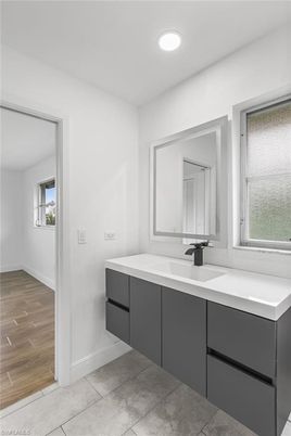 Bathroom, Dual Sink Vanities, Interior, Recessed Lighting, Wood Texture Flooring