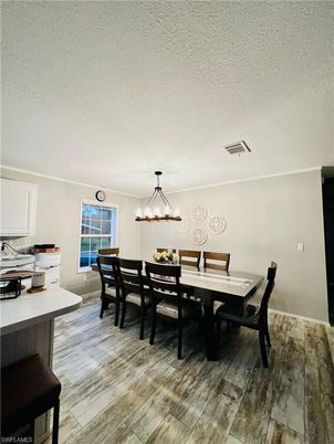 Dining room, Interior, Pendant Lights, Wood Texture Flooring