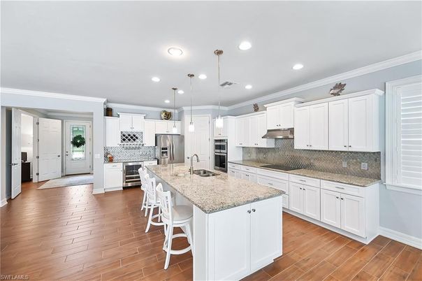 Interior, Kitchen, Pendant Lights, Recessed Lighting, Stainless Steel Appliances, Wood Texture Flooring