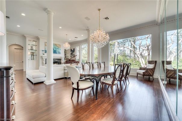 Chandelier, Dining room, Fireplace, Interior, Living room, Recessed Lighting, Wood Texture Flooring
