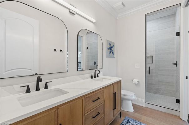 Bathroom, Dual Sink Vanities, Glass Shower, Interior, Wood Texture Flooring