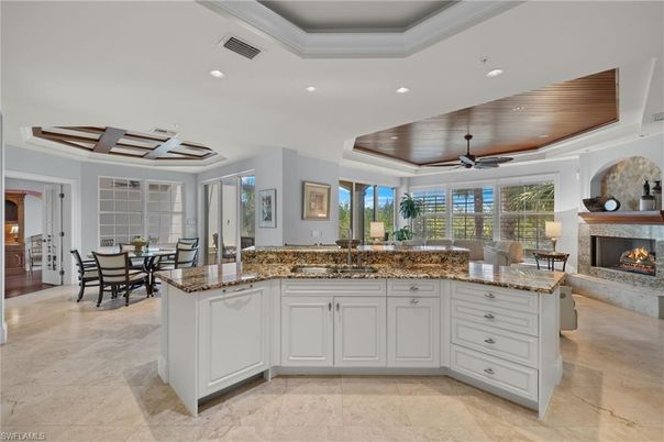 Dining room, Fireplace, Interior, Living room, Recessed Lighting, Wooden Ceilings
