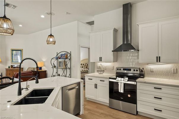 Interior, Kitchen, Pendant Lights, Recessed Lighting, Stainless Steel Appliances, Wood Texture Flooring