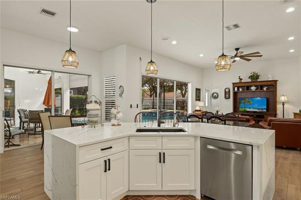 Dining room, Interior, Kitchen, Living room, Pendant Lights, Recessed Lighting, Stainless Steel Appliances, Wood Texture Flooring