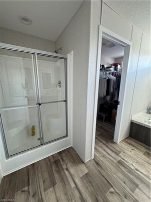 Bathroom, Glass Shower, Interior, Walk-in Closets, Wood Texture Flooring