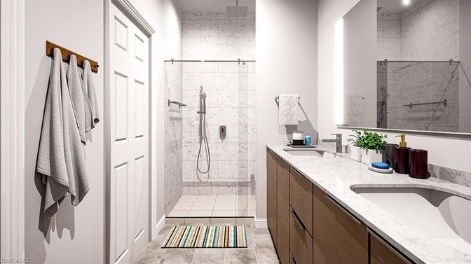 Bathroom, Dual Sink Vanities, Glass Shower, Interior, Marble Walls, Recessed Lighting
