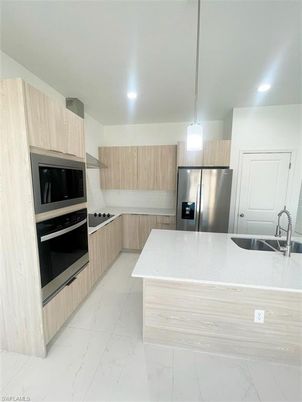 Interior, Kitchen, Marble, Pendant Lights, Recessed Lighting, Stainless Steel Appliances