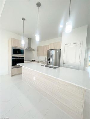 Interior, Kitchen, Marble, Pendant Lights, Recessed Lighting, Stainless Steel Appliances