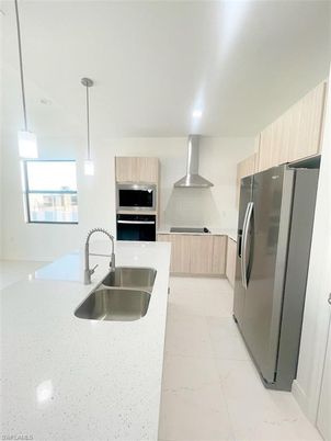 Interior, Kitchen, Marble, Pendant Lights, Recessed Lighting, Stainless Steel Appliances