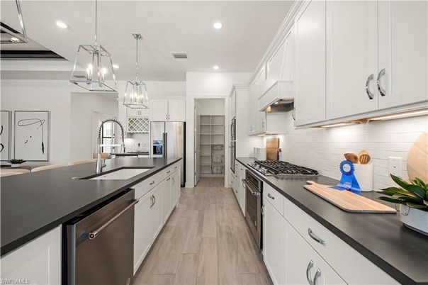 Interior, Kitchen, Pendant Lights, Recessed Lighting, Stainless Steel Appliances, Wood Texture Flooring
