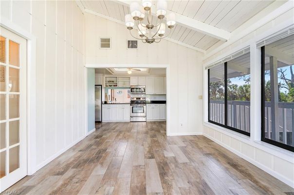 Chandelier, Empty room, Interior, Kitchen, Stainless Steel Appliances, Wood Texture Flooring