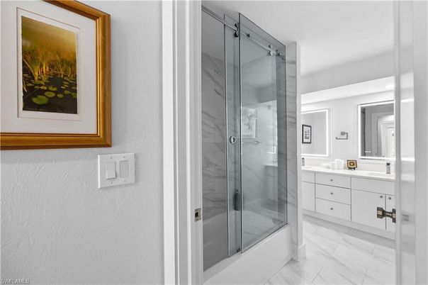 Bathroom, Dual Sink Vanities, Glass Shower, Interior, Marble, Marble Walls
