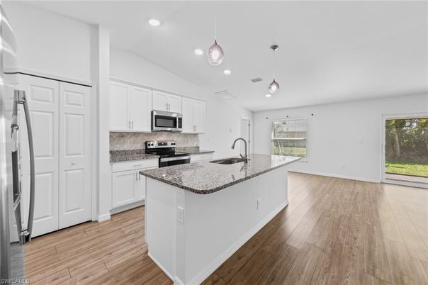 Interior, Kitchen, Pendant Lights, Recessed Lighting, Stainless Steel Appliances, Wood Texture Flooring