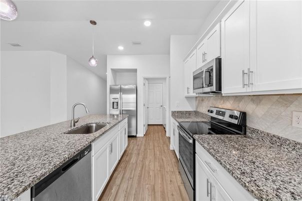 Interior, Kitchen, Pendant Lights, Recessed Lighting, Stainless Steel Appliances, Wood Texture Flooring