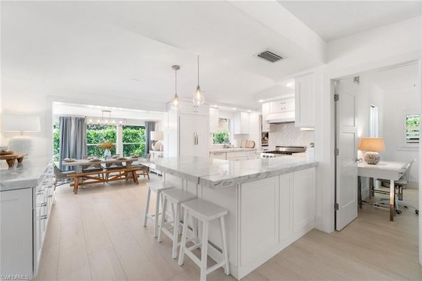 Dining room, Interior, Kitchen, Pendant Lights, Recessed Lighting, Stainless Steel Appliances, Wood Texture Flooring