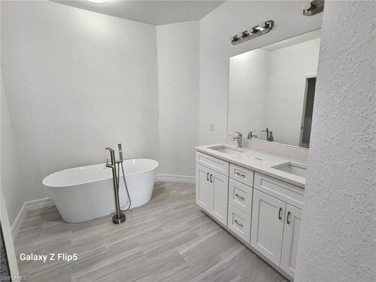 Bathroom, Dual Sink Vanities, Free Standing Baths, Interior, Wood Texture Flooring
