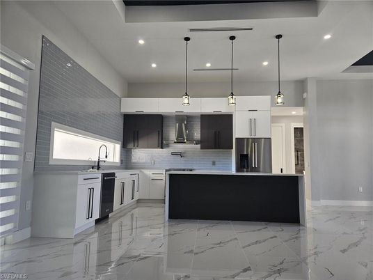 Interior, Kitchen, Marble, Pendant Lights, Recessed Lighting, Stainless Steel Appliances