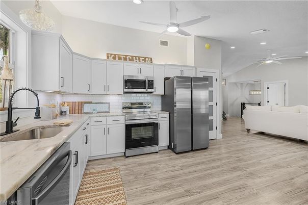 Interior, Kitchen, Living room, Recessed Lighting, Stainless Steel Appliances, Wood Texture Flooring