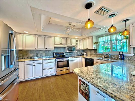Interior, Kitchen, Pendant Lights, Recessed Lighting, Stainless Steel Appliances, Wood Texture Flooring