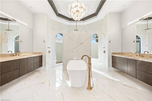 Bathroom, Chandelier, Dual Sink Vanities, Free Standing Baths, Interior, Marble, Marble Walls
