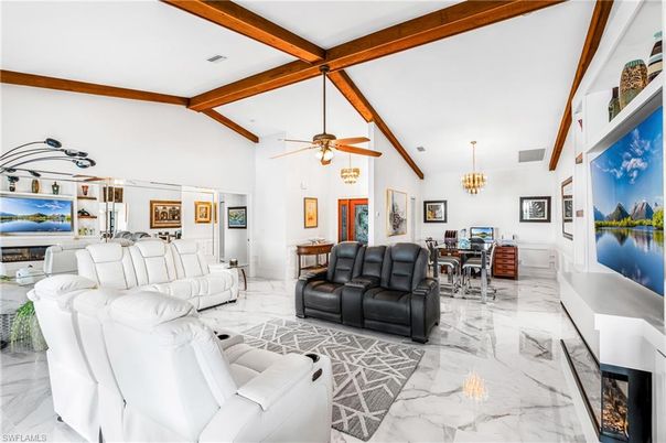 Chandelier, Dining room, Fireplace, Interior, Living room, Marble, Wooden Beams