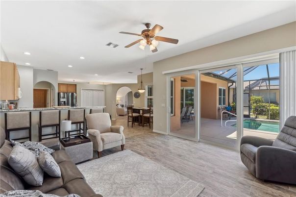 Dining room, Interior, Kitchen, Living room, Pendant Lights, Recessed Lighting, Stainless Steel Appliances, Wood Texture Flooring