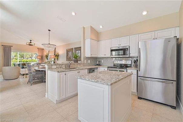 Chandelier, Dining room, Interior, Kitchen, Living room, Pendant Lights, Recessed Lighting, Stainless Steel Appliances