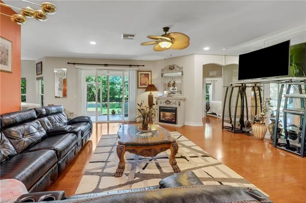 Fireplace, Interior, Living room, Recessed Lighting, Wood Texture Flooring