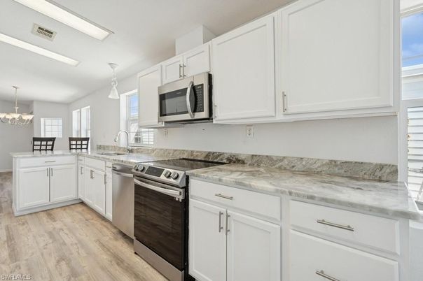 Interior, Kitchen, Pendant Lights, Stainless Steel Appliances, Wood Texture Flooring