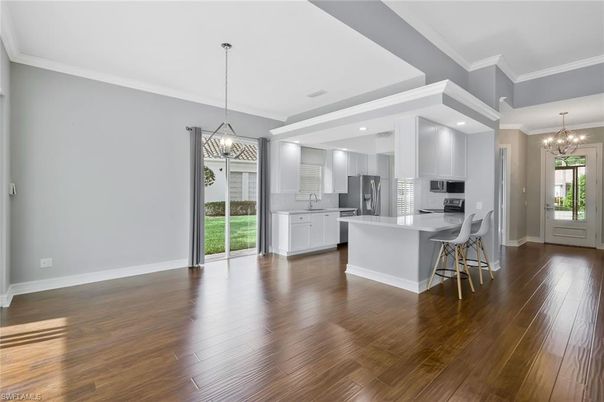 Chandelier, Interior, Kitchen, Pendant Lights, Recessed Lighting, Stainless Steel Appliances, Wood Texture Flooring