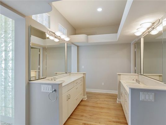 Bathroom, Dual Sink Vanities, Interior, Recessed Lighting, Wood Texture Flooring
