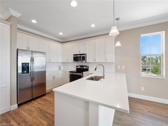 Interior, Kitchen, Pendant Lights, Recessed Lighting, Stainless Steel Appliances, Wood Texture Flooring