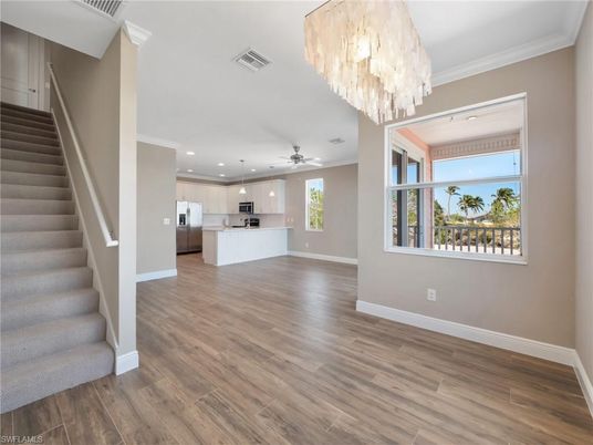 Chandelier, Interior, Kitchen, Recessed Lighting, Stainless Steel Appliances, Wood Texture Flooring