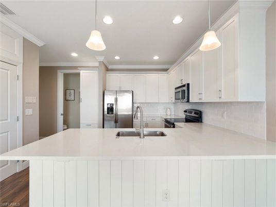 Interior, Kitchen, Pendant Lights, Recessed Lighting, Stainless Steel Appliances, Wood Texture Flooring