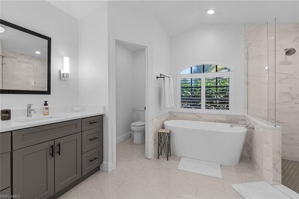 Bathroom, Dual Sink Vanities, Free Standing Baths, Glass Shower, Interior, Marble, Marble Walls, Recessed Lighting