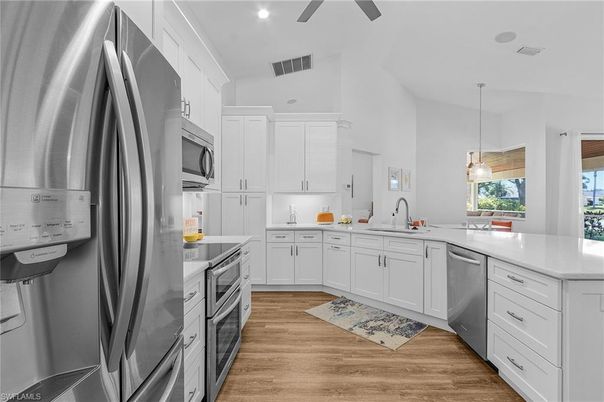 Interior, Kitchen, Pendant Lights, Recessed Lighting, Stainless Steel Appliances, Wood Texture Flooring