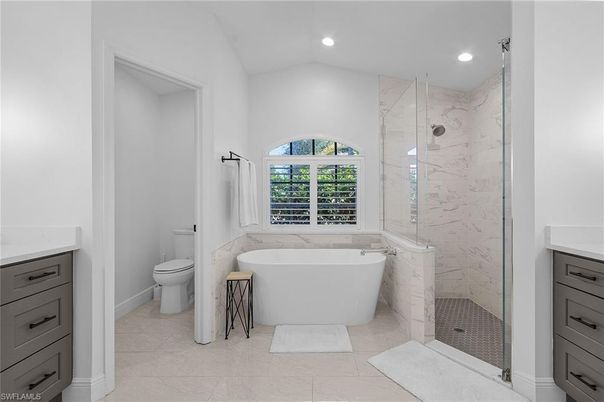 Bathroom, Free Standing Baths, Glass Shower, Interior, Marble Walls, Recessed Lighting