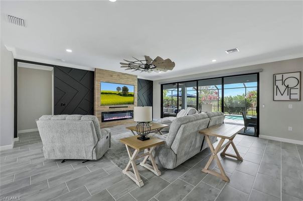 Fireplace, Interior, Living room, Recessed Lighting, Wood Texture Flooring