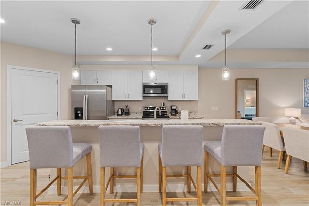 Interior, Kitchen, Pendant Lights, Recessed Lighting, Stainless Steel Appliances, Wood Texture Flooring